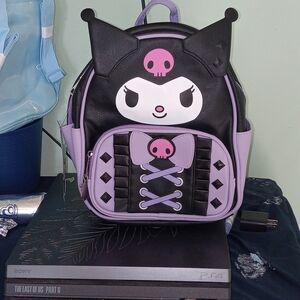 Playful Black and Purple Character Backpack